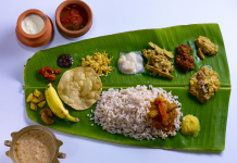 Kerala food thali in a banana leaf